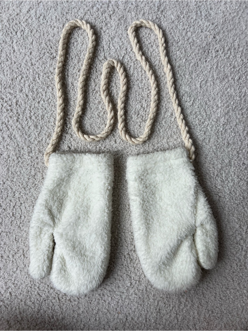 Fuzzy fleece mittens with rope tether
